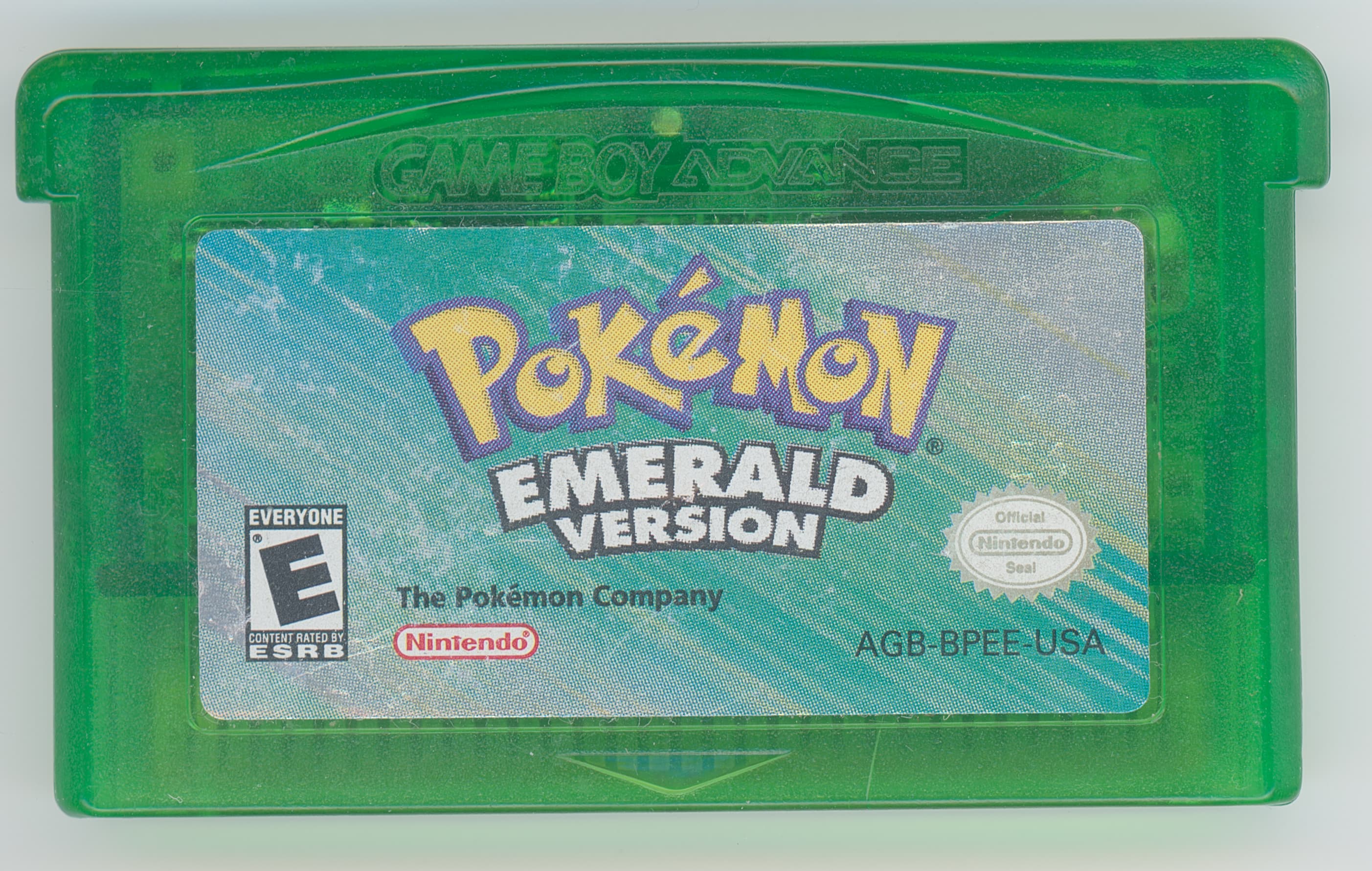 English US Pokémon Emerald cartridge showing the AGB-BPEE-USA label code and ESRB E rating