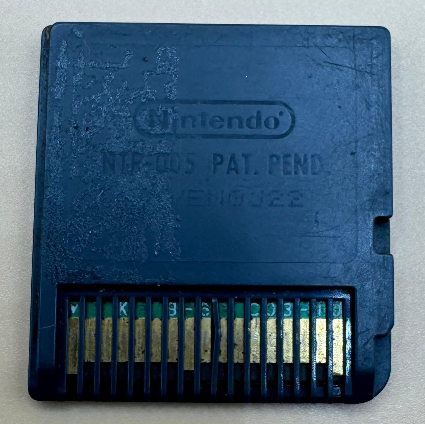 Rear of the English Explorers of Darkness cartridge with Nintendo lettering, NTR-005 marking and contact pins